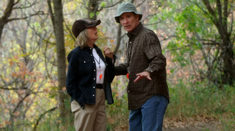 Diane Keaton and Kevin Kline in woods