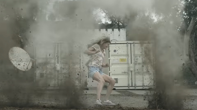 A girl is surrounded by gunfire in Red State