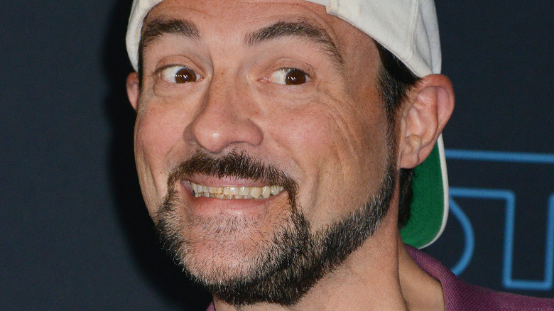 Kevin Smith smiling on red carpet