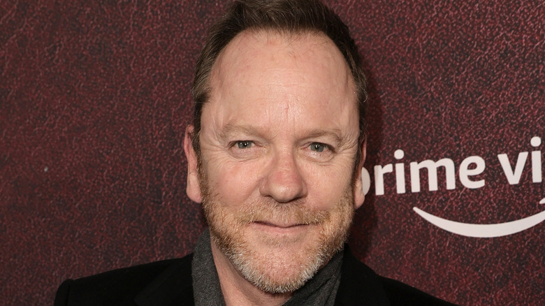 Kiefer Sutherland smiling at an event