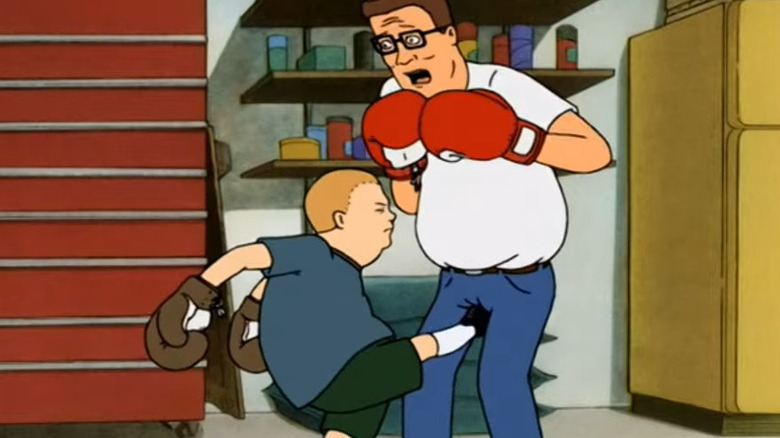 Bobby kicking Hank below the belt in "King of the Hill"