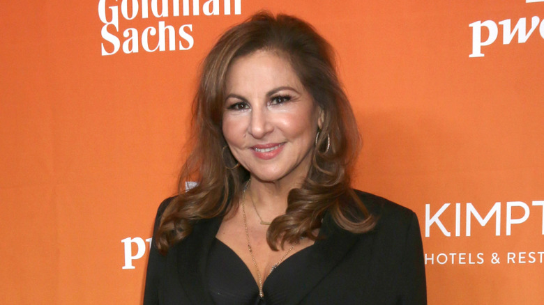 Kathy Najimy posing at a premier