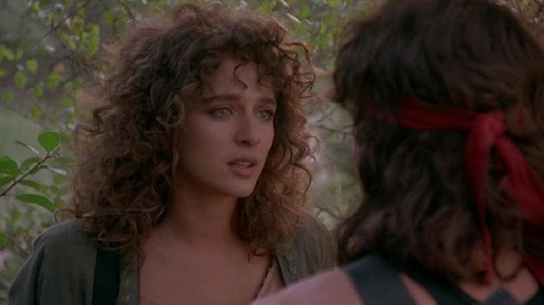 Charlie Sheen kissing Valeria Golino's nose