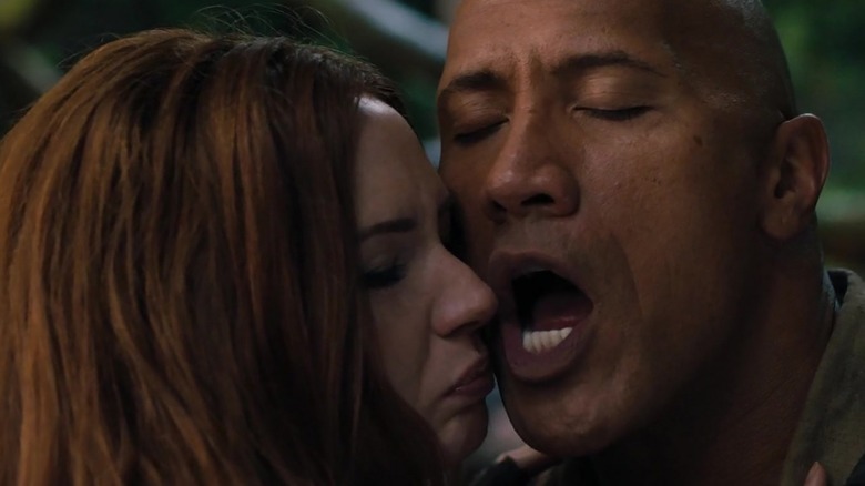 Karen Gillan awkwardly kissing Dwayne Johnson