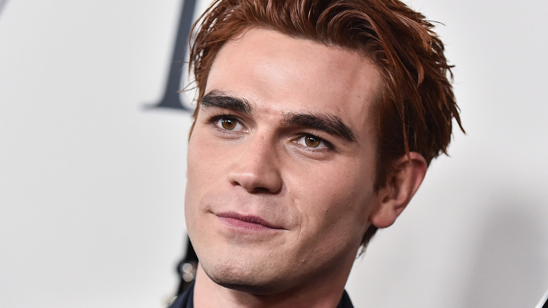 KJ Apa smiling