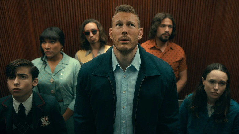The Hargreeves family in an elevator