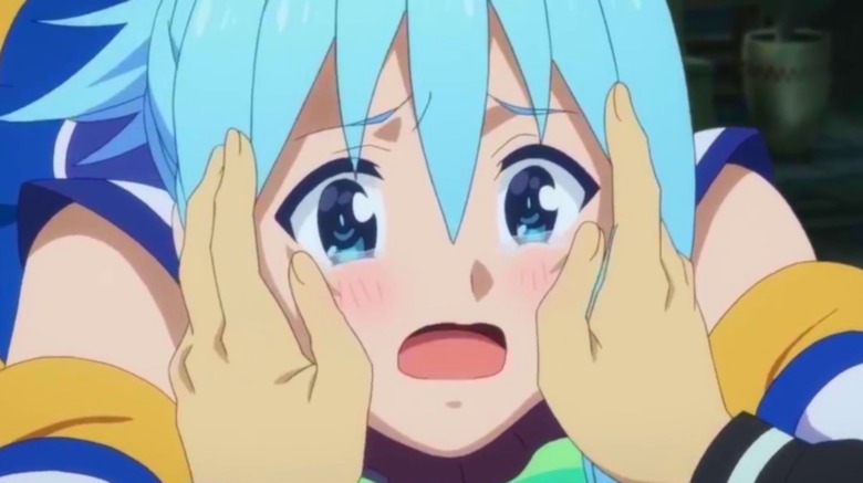 Aqua having her face squeezed