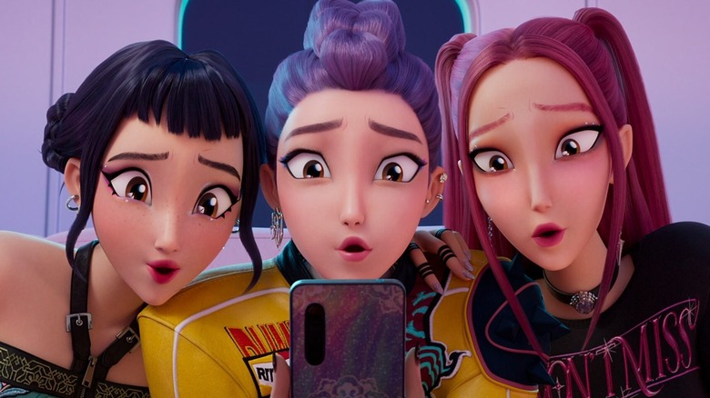 Zoey, Rumi, and Mira swoon over a phone call in KPop Demon Hunters