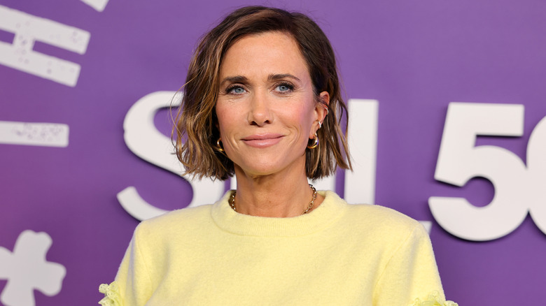 Kristen Wiig attending SNL50
