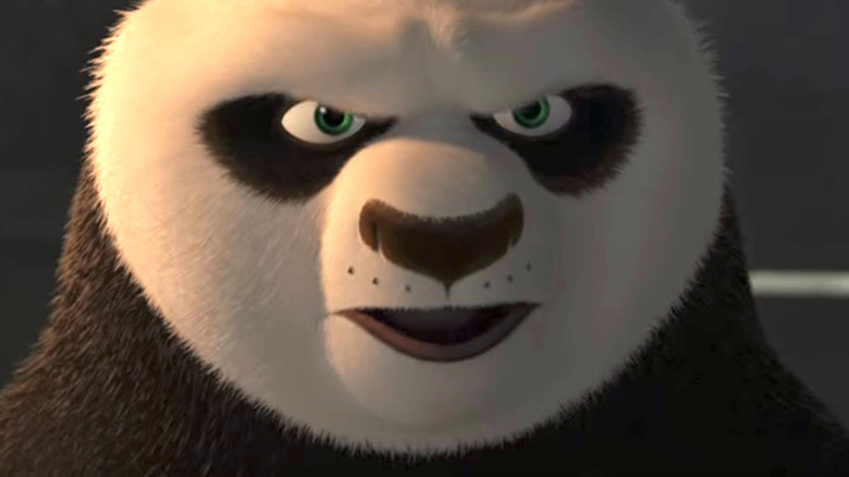 Po furrowing his eyebrows