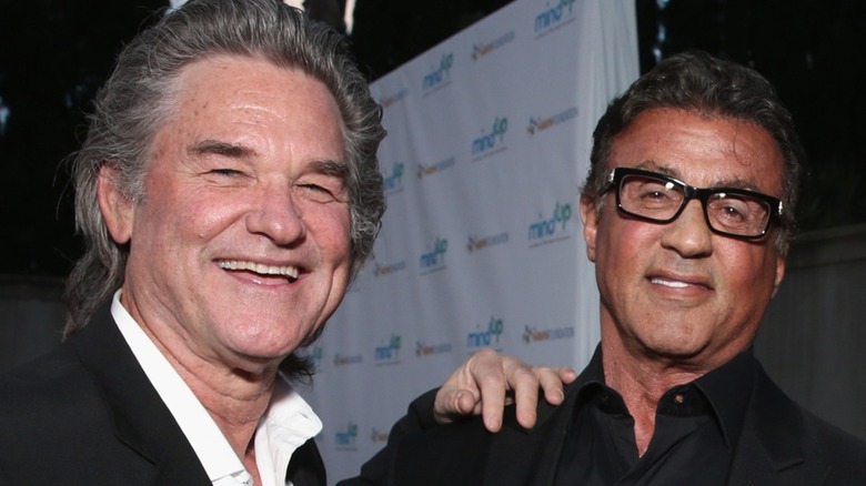 Kurt Russell and Sylvester Stallone smiling together at Goldie's Love In For Kids (2016)