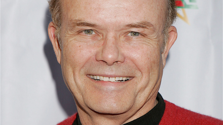 Kurtwood Smith in a red sweater