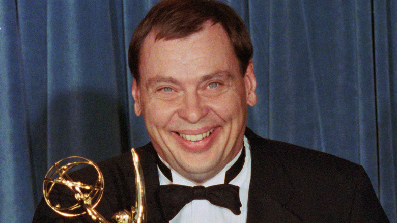 The late Larry Drake holds his Emmy