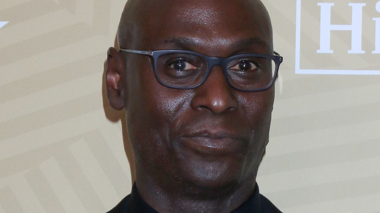 Lance Reddick looking