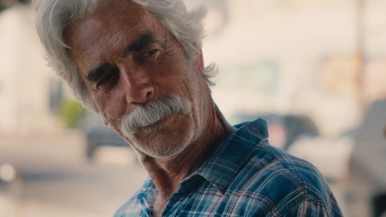 Hayden tilts his head in The Hero