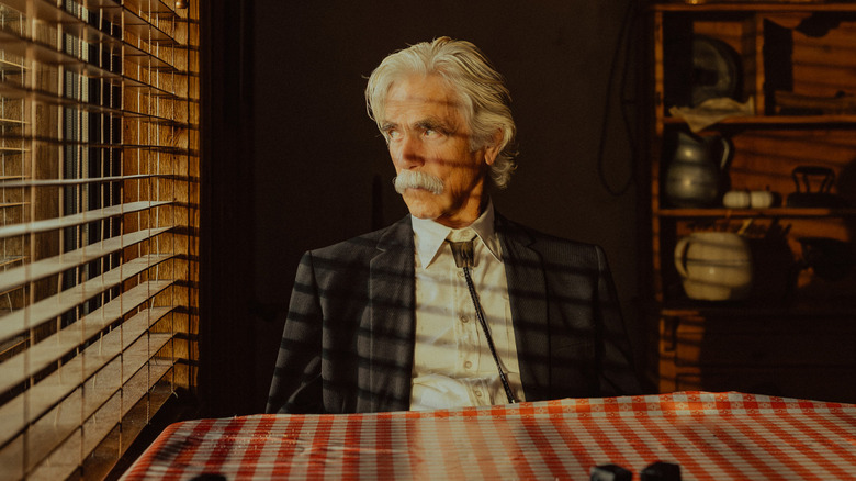 T.L. Norris stares out a window in "Landman"