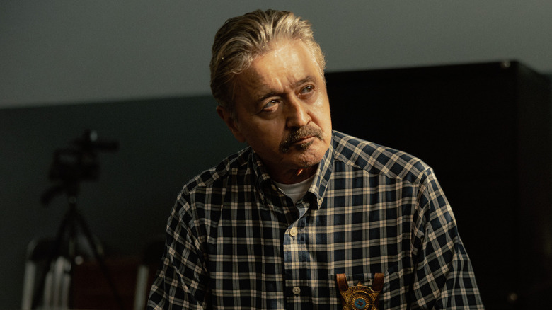 Walt Joeberg wearing his badge in "Landman"