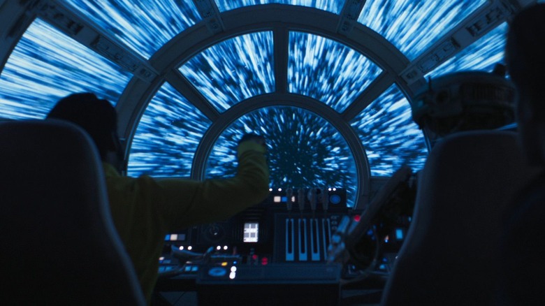 Lando and L3-37 fly the Millennium Falcon in Solo: A Star Wars Story