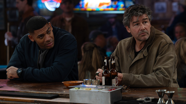 John Stewart and Hal Jordan sit at a bar in "Lanterns" (2026)