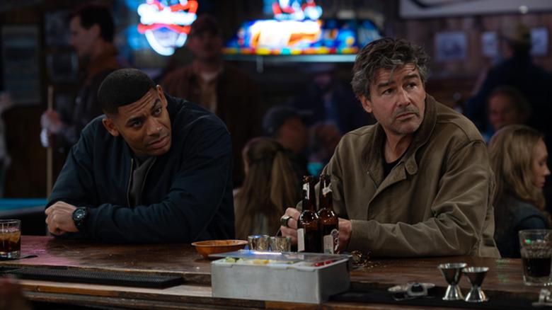 John Stewart and Hal Jordan sitting at a bar in "Lanterns" (2026)