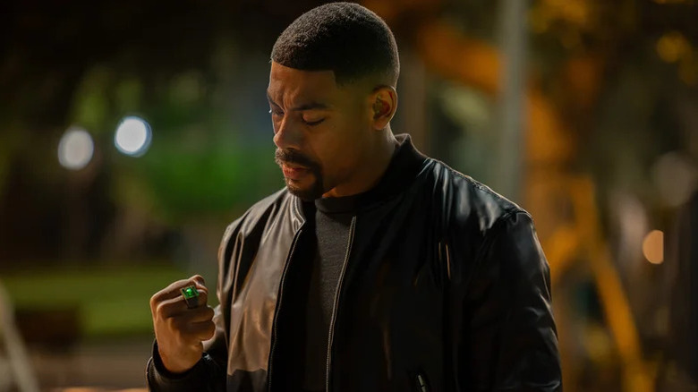 John Stewart looking at his power ring on Lanterns