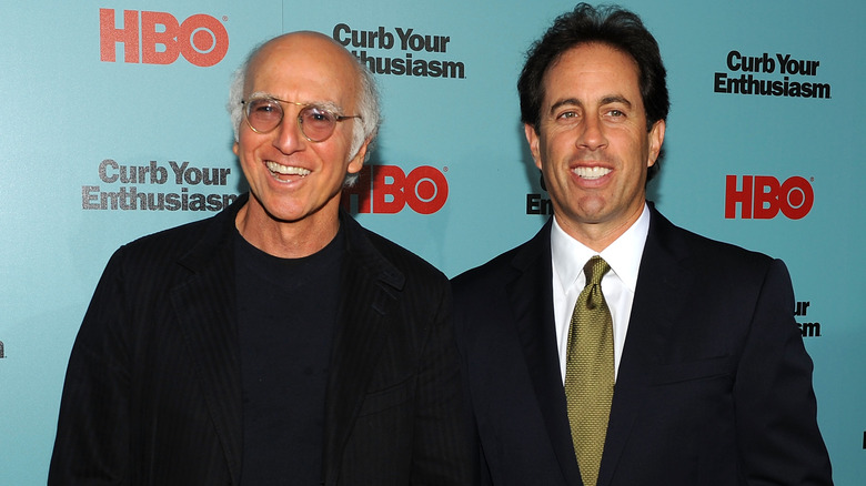 Larry David and Jerry Seinfeld smiling