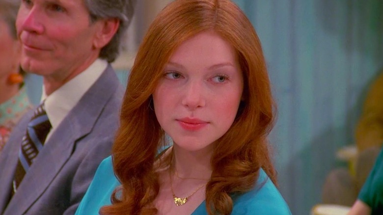 Laura Prepon stoic