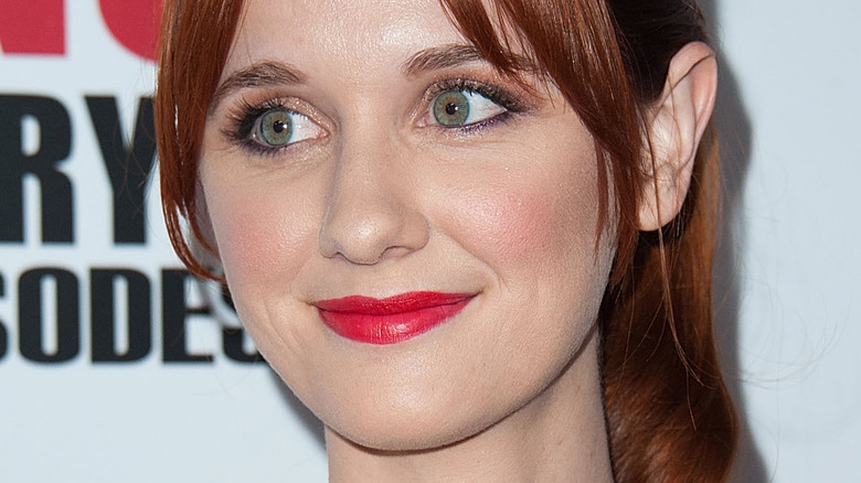 Laura Spencer pink lipstick small smile