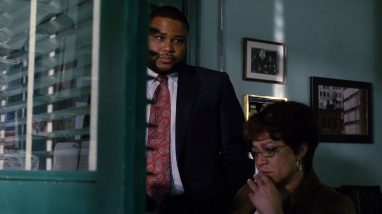Anthony Anderson and S. Epatha Merkerson looking contemplative
