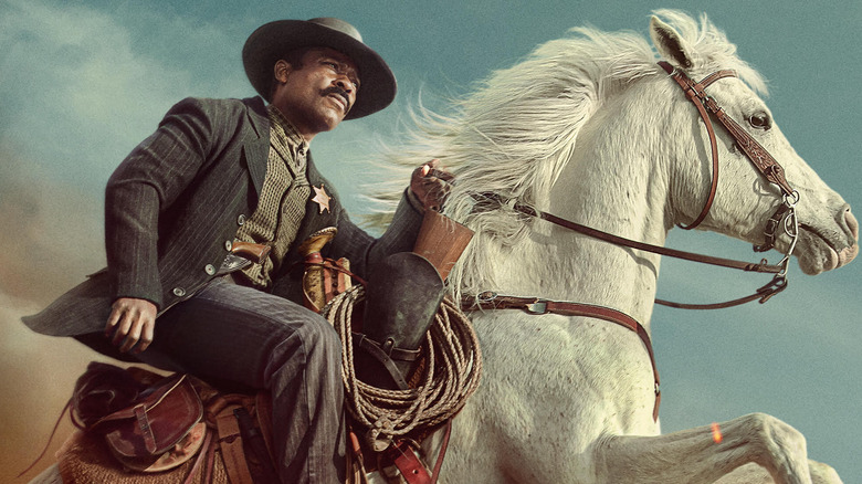Bass Reeves riding white horse