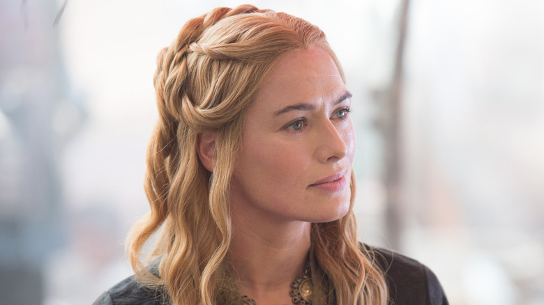 Cersei with long hair and braids looking to the side on Game of Thrones