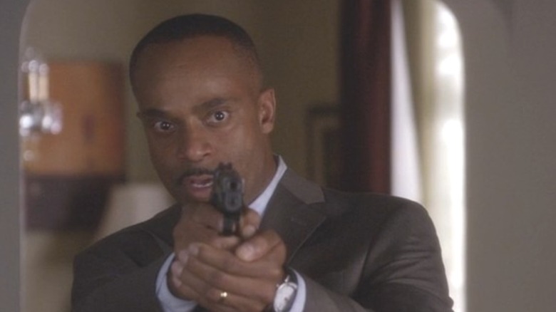 Vance points a gun in "NCIS" (2003-present)
