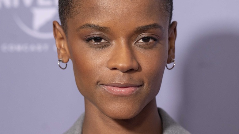 Letitia Wright smirking