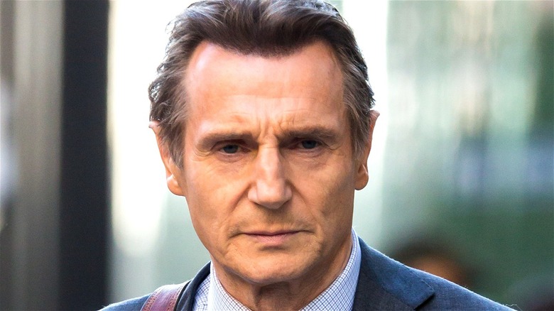 Liam Neeson staring