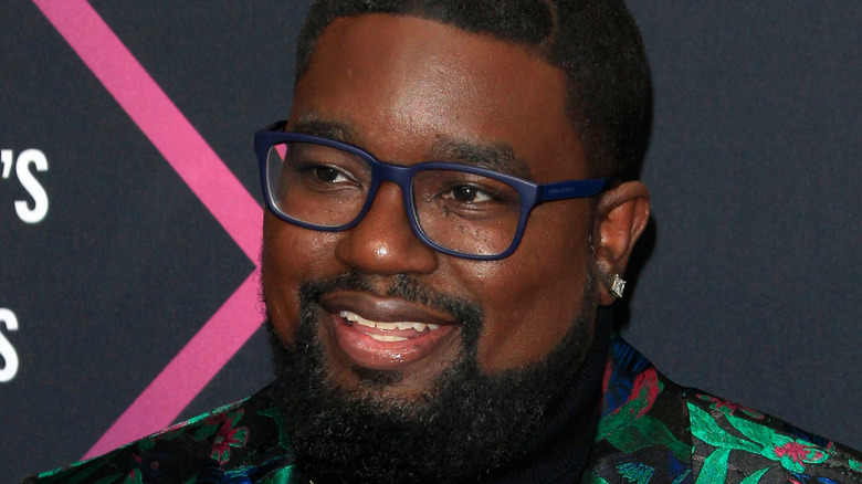 Lil Rel Howery smiling glasses