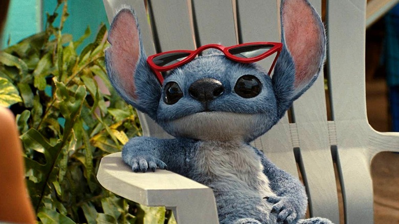 Stitch wearing sunglasses in a chair in Lilo & Stitch