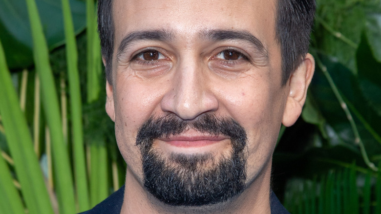 Lin-Manuel Miranda smiling to camera