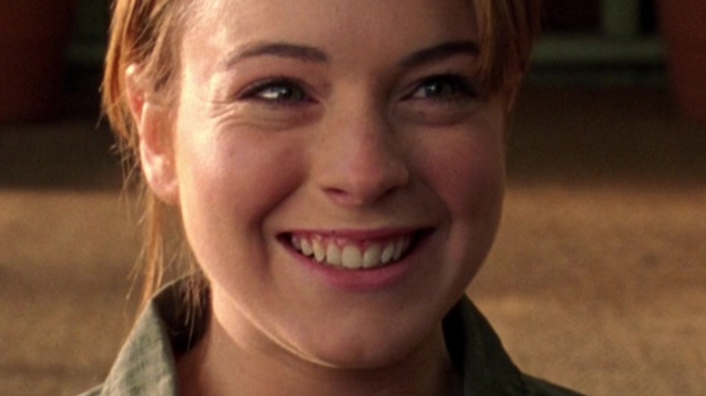 Cady smiling at her parents