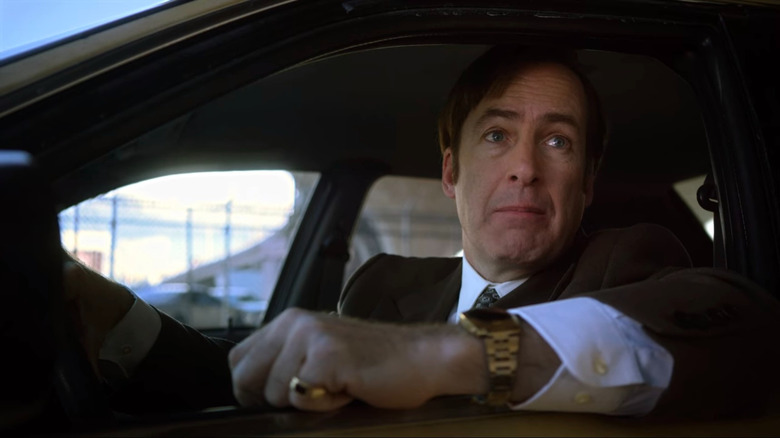 Saul Goodman sits in car