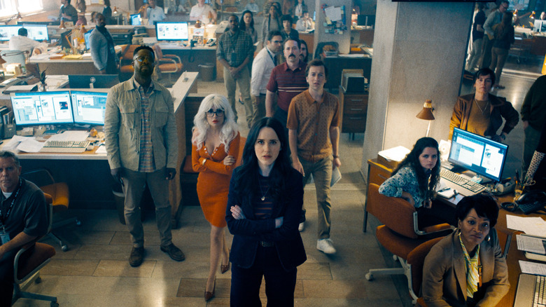 Lois Lane standing with Daily Planet journalists in Superman (2025)