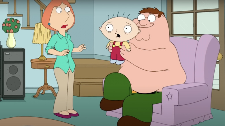 Peter shaking Brian, Lois watches