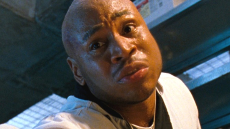 Preacher reaches down looking concerned