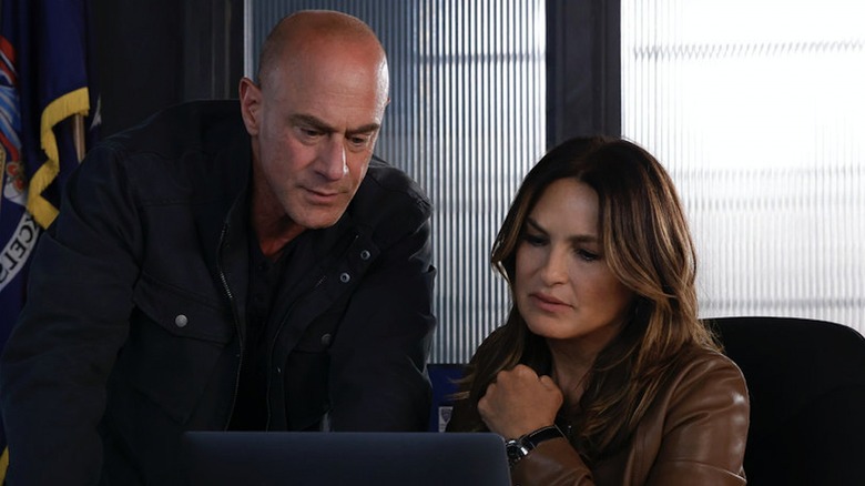 Stabler and Benson hunched over a computer