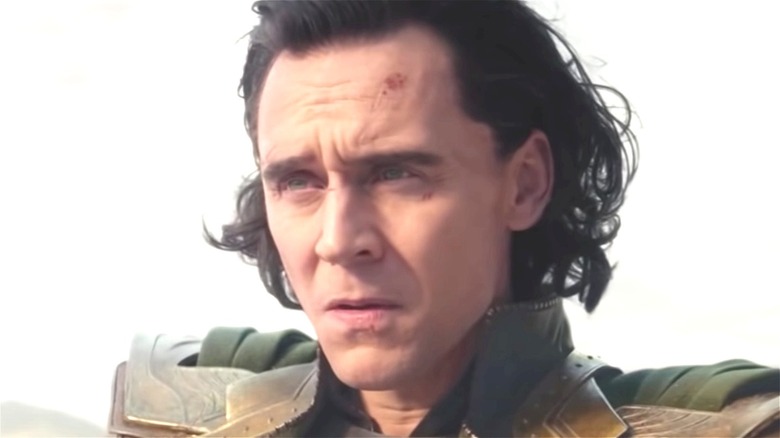 Loki frowning in the sand
