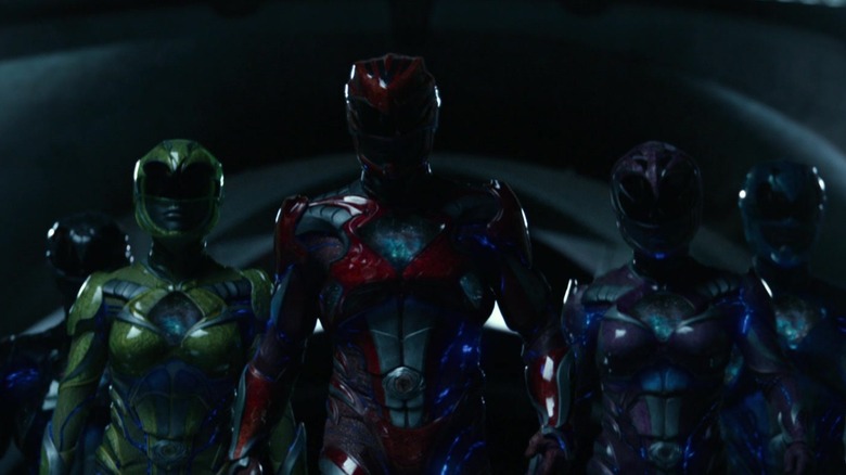 The Power Rangers walking in formation