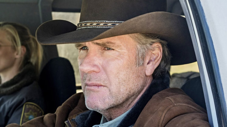 Longmire behind the wheel