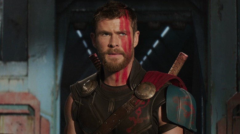   Chris Hemsworth com a Thor