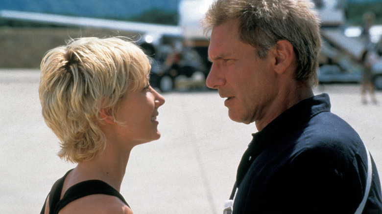 Anne Heche and Harrison Ford looking at each other