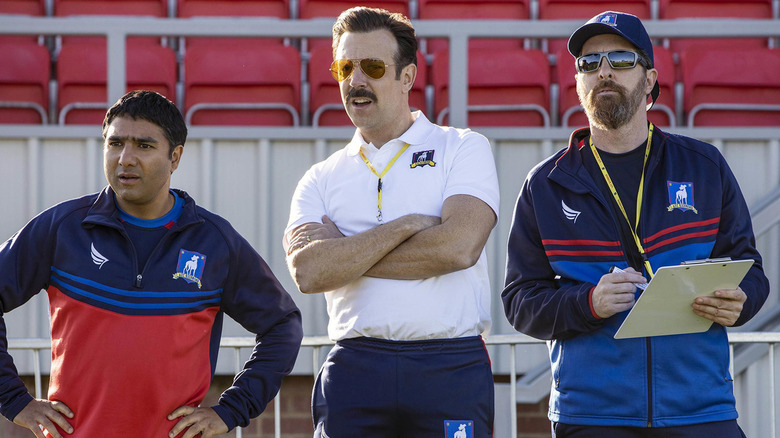 Ted, Nate, and Beard watching practice 