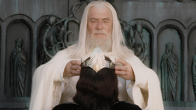 Gandalf putting crown on Aragorn's head